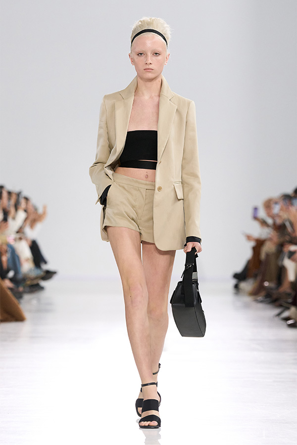 Max Mara Spring/Summer 2026 Fashion Show - Beige Look with blazer, shorts and black bag.