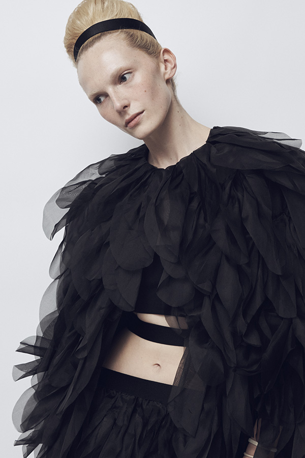 Max Mara Spring/Summer 2026 Fashion Show - Model with black look with Jacket and Skirt with detailing.